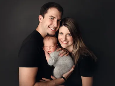 Jen Pav, with her husband and baby boy